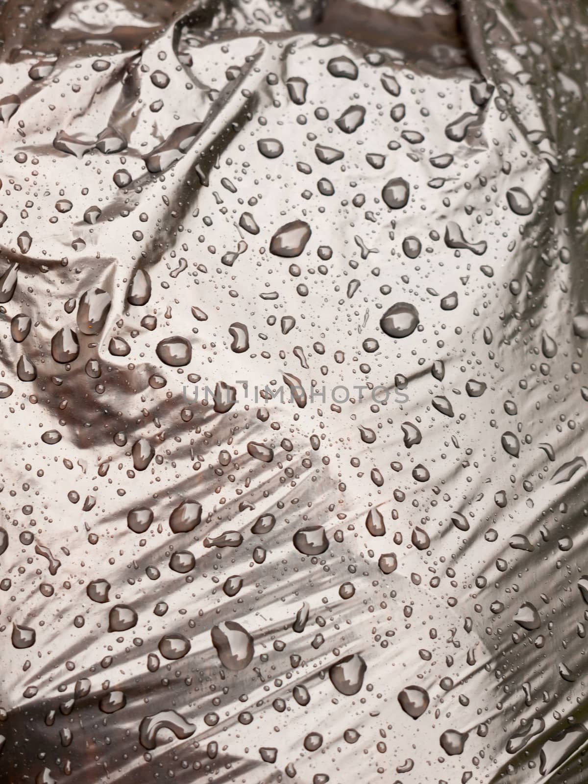 water close drops up on a black bin bag; Essex; UK