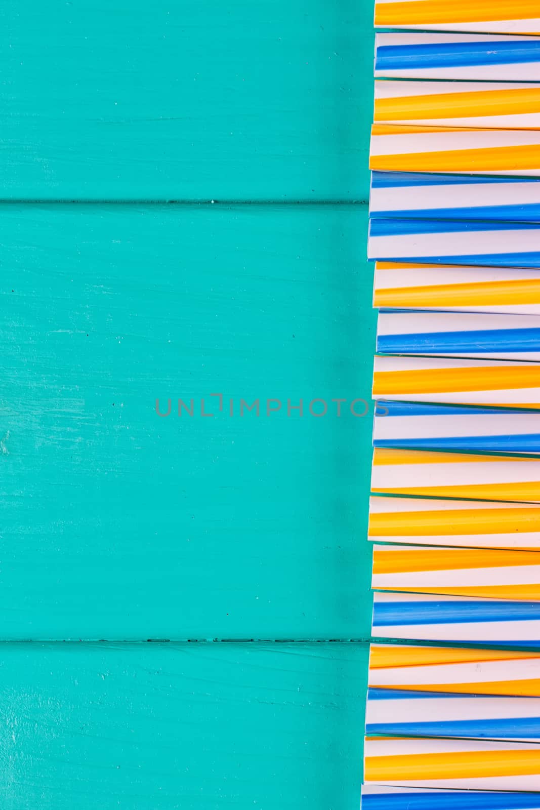 Drinking straws for party on blue pastel background with copy space by victosha
