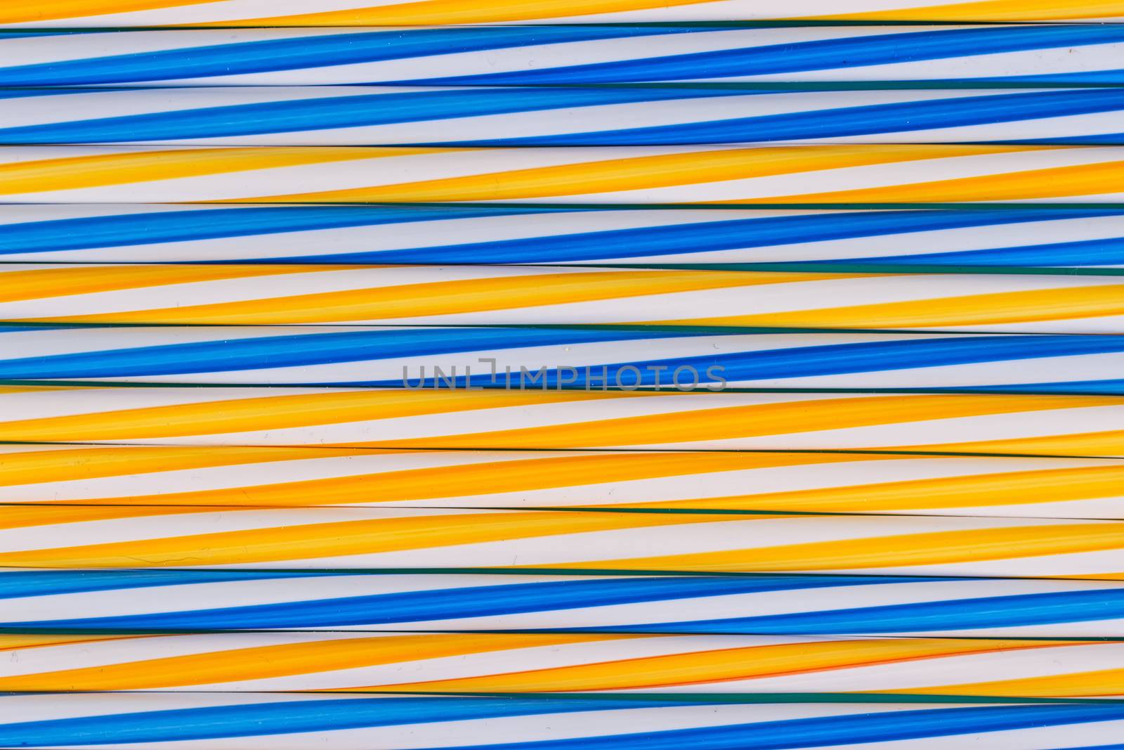 Background stripes multicolored smoothies plastic cocktail straws