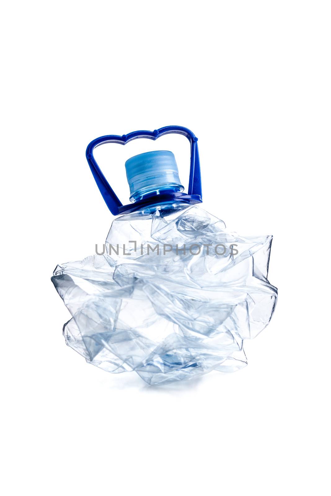 smashed empty plastic bottle, isolated on white background