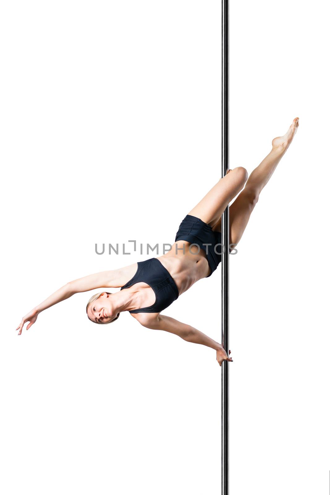 pole dance girl exercising and posing against white background