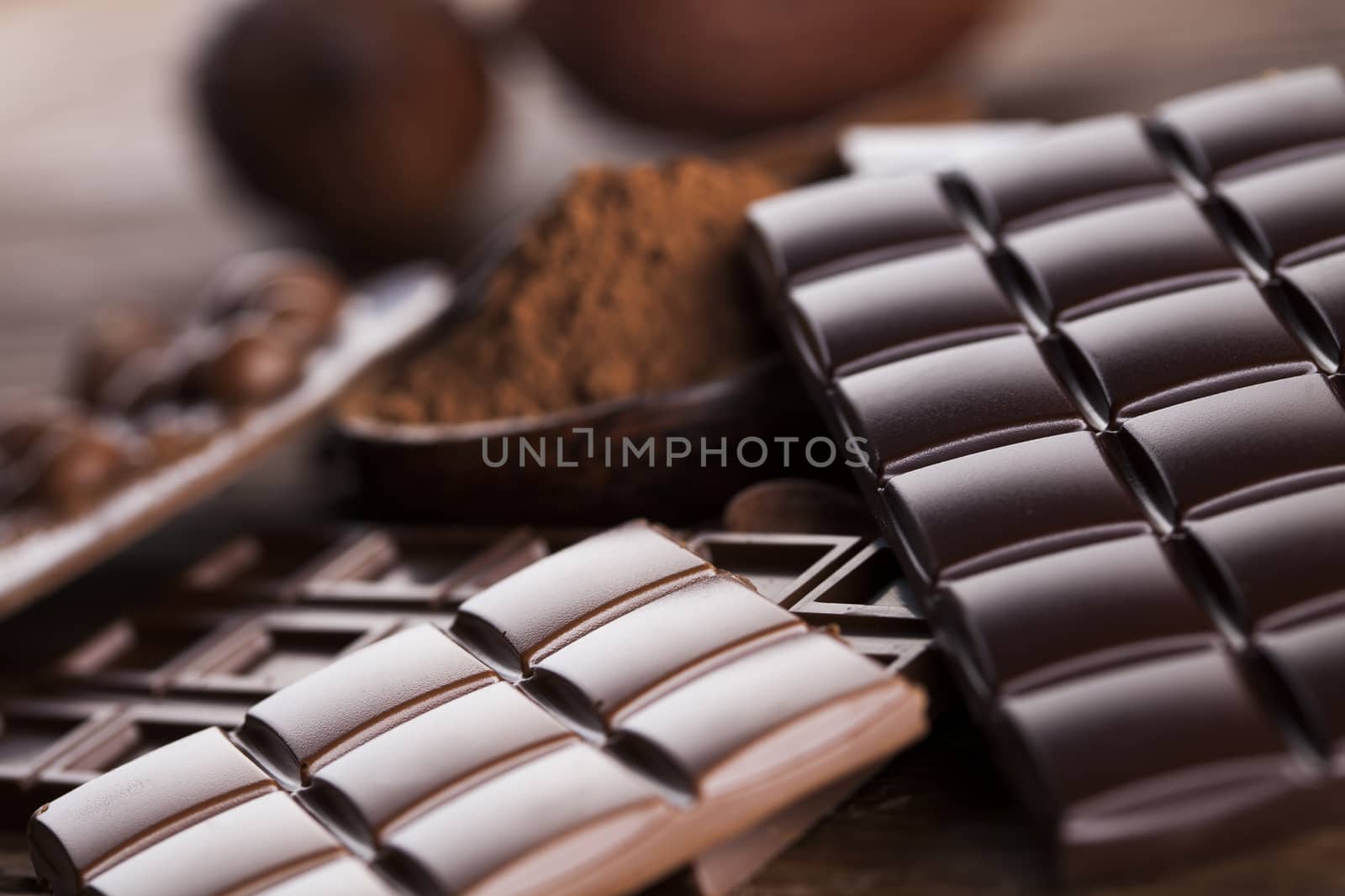 Chocolate bar, candy sweet, dessert food on wooden background by JanPietruszka