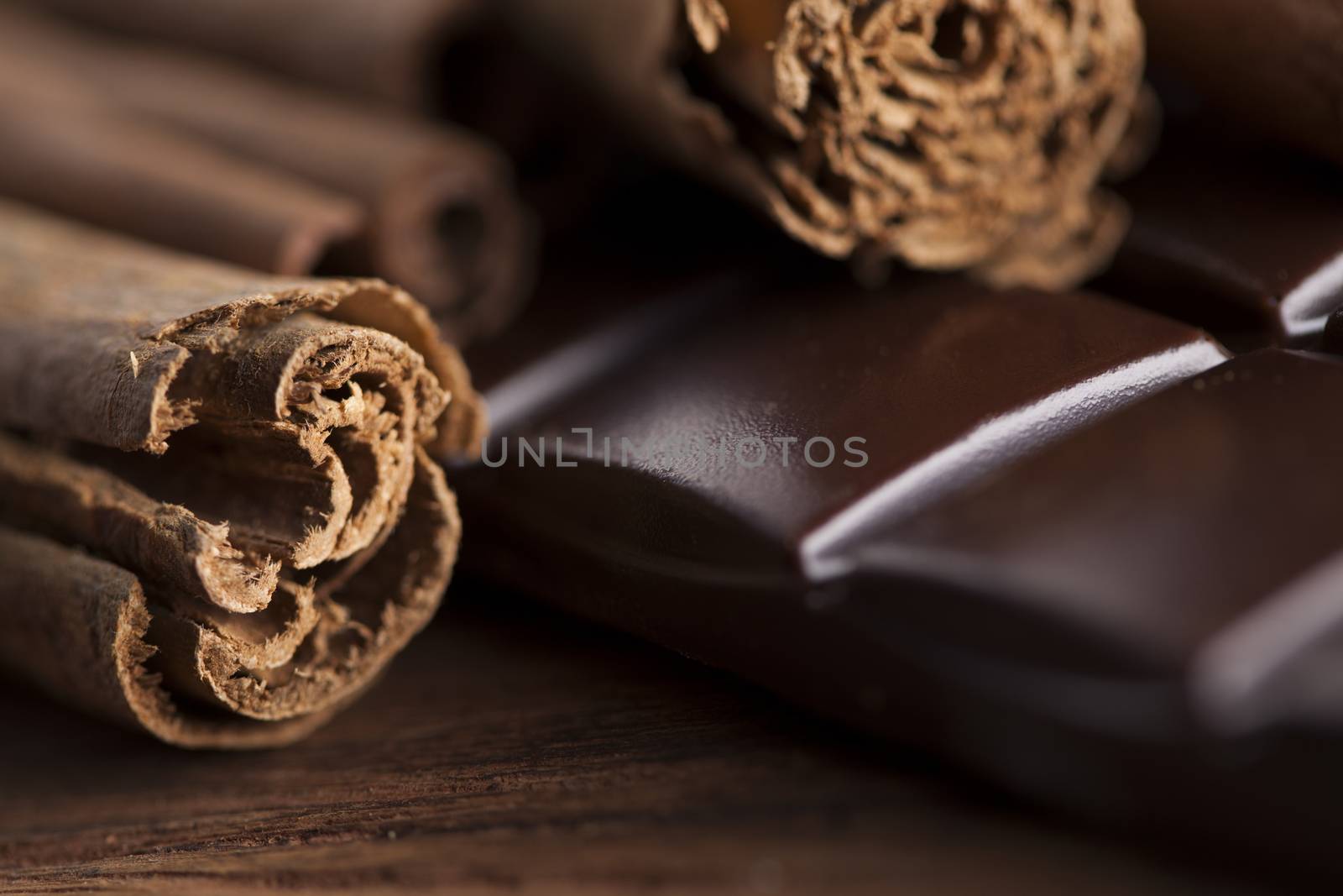 Dark chocolate with  candy sweet, dessert food, cinnamon by JanPietruszka