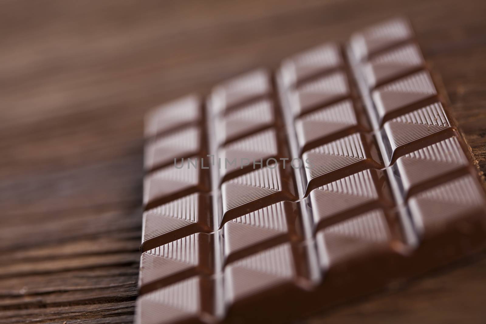 Chocolate , candy sweet, dessert food on wooden background