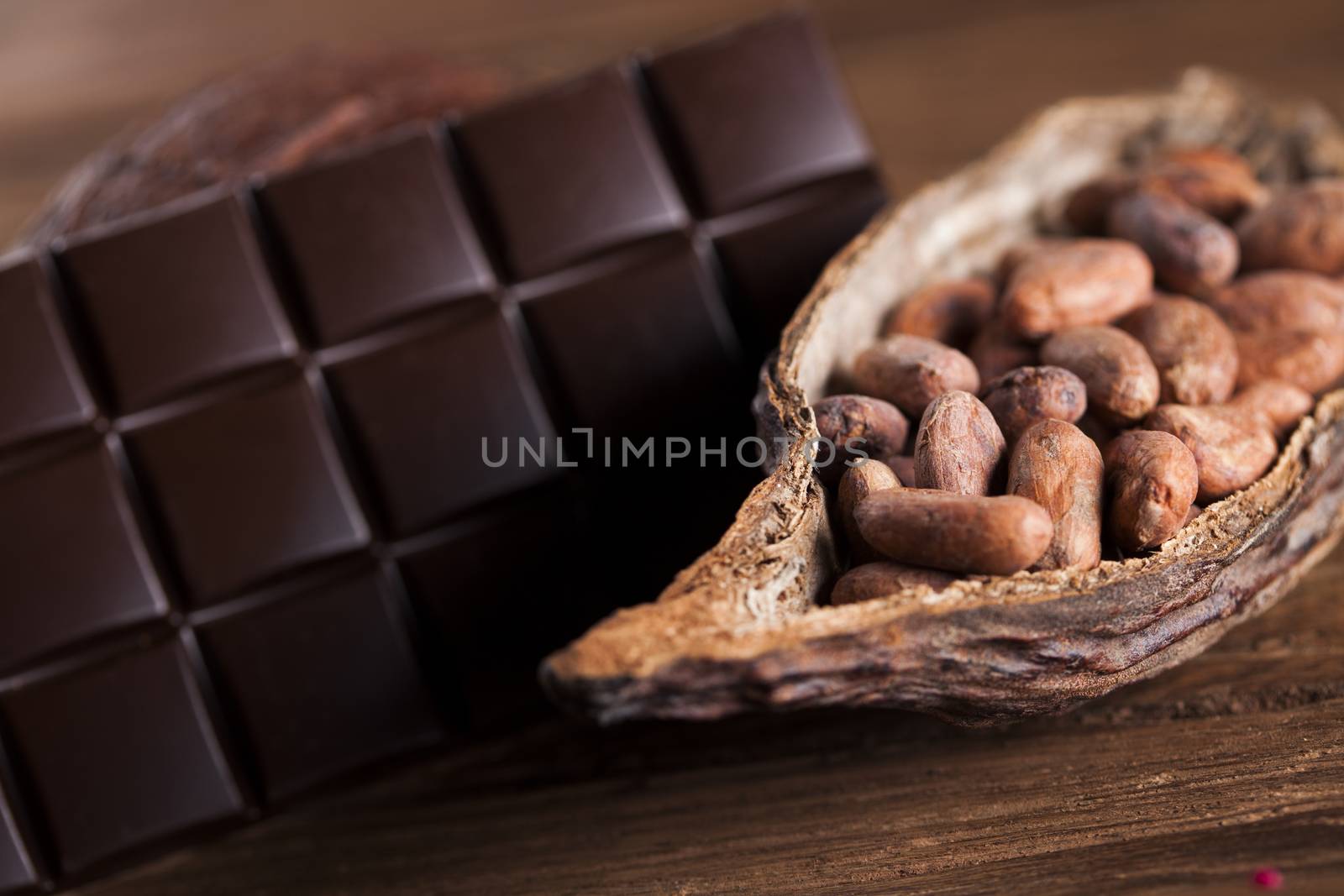 Cocoa pod on wooden background