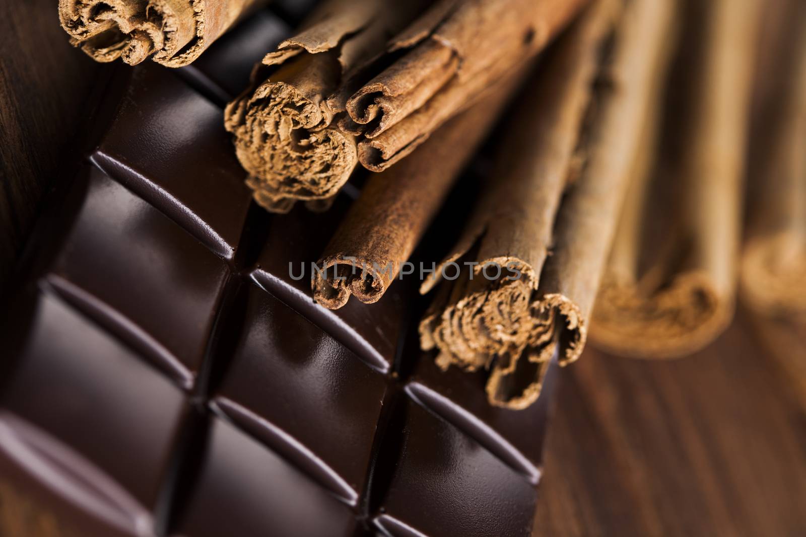 Dark chocolate with  candy sweet, dessert food, cinnamon by JanPietruszka