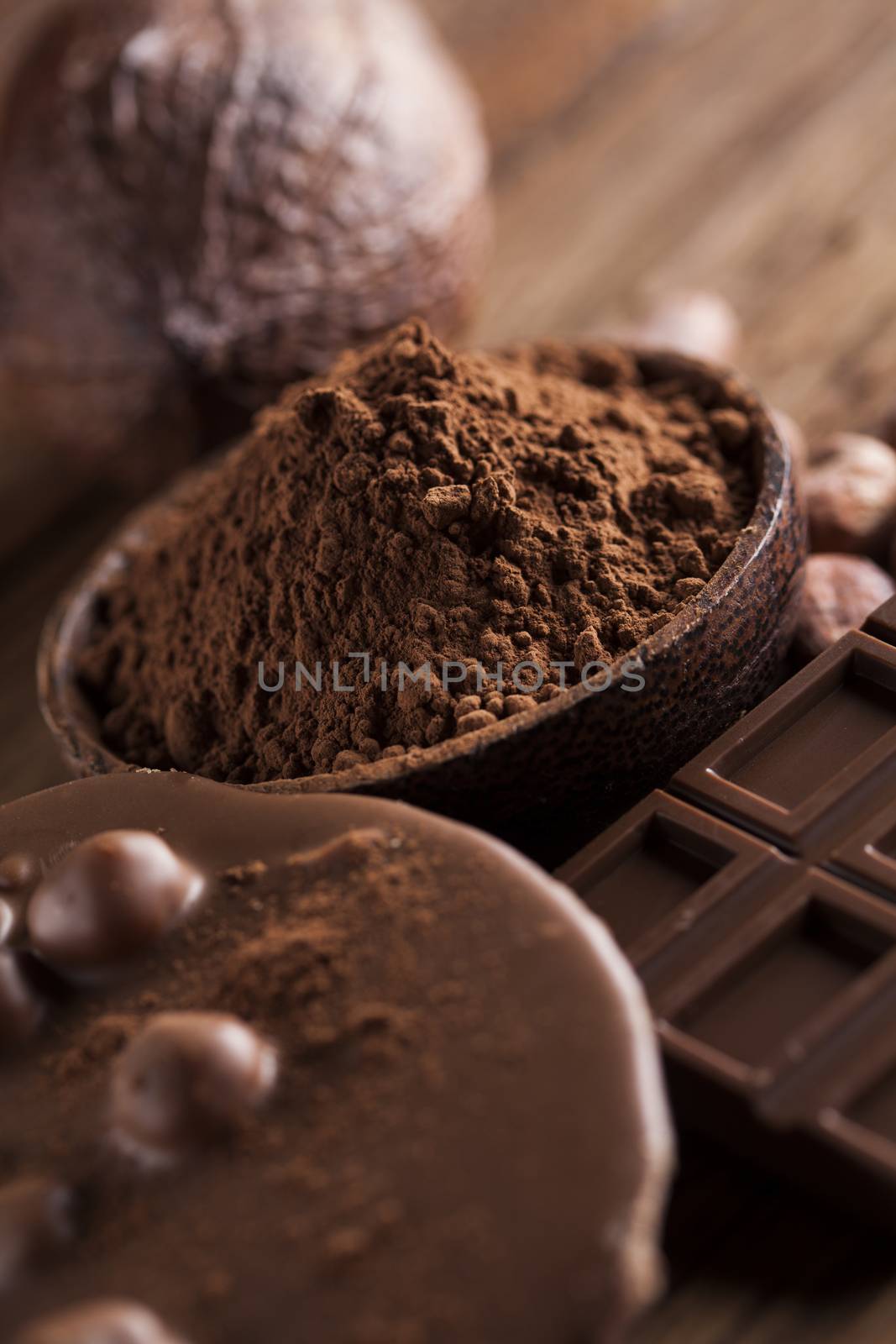 Chocolate sweet, cocoa pod and food dessert background by JanPietruszka