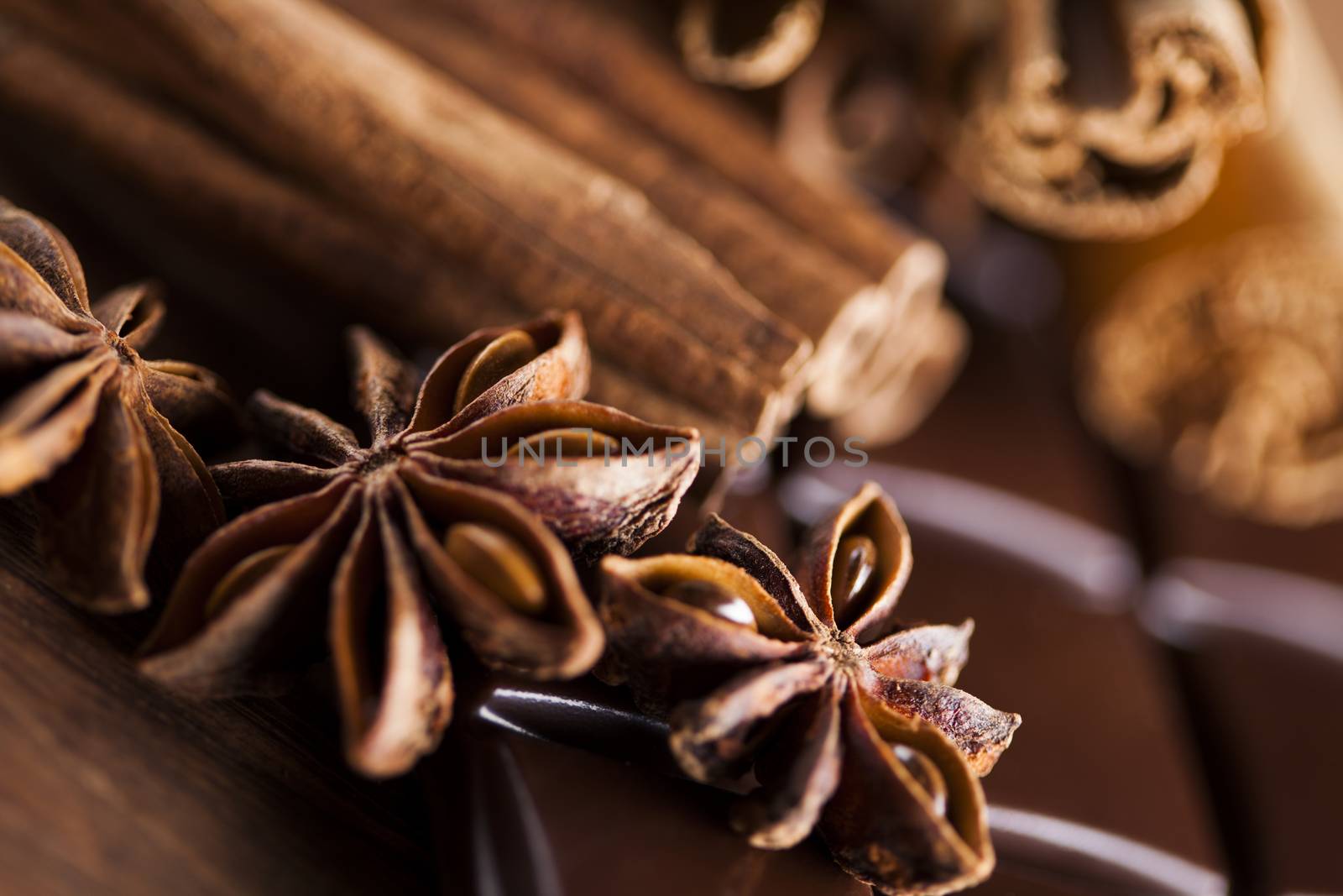 Cinnamon and anise, Dark chocolate with candy sweet by JanPietruszka
