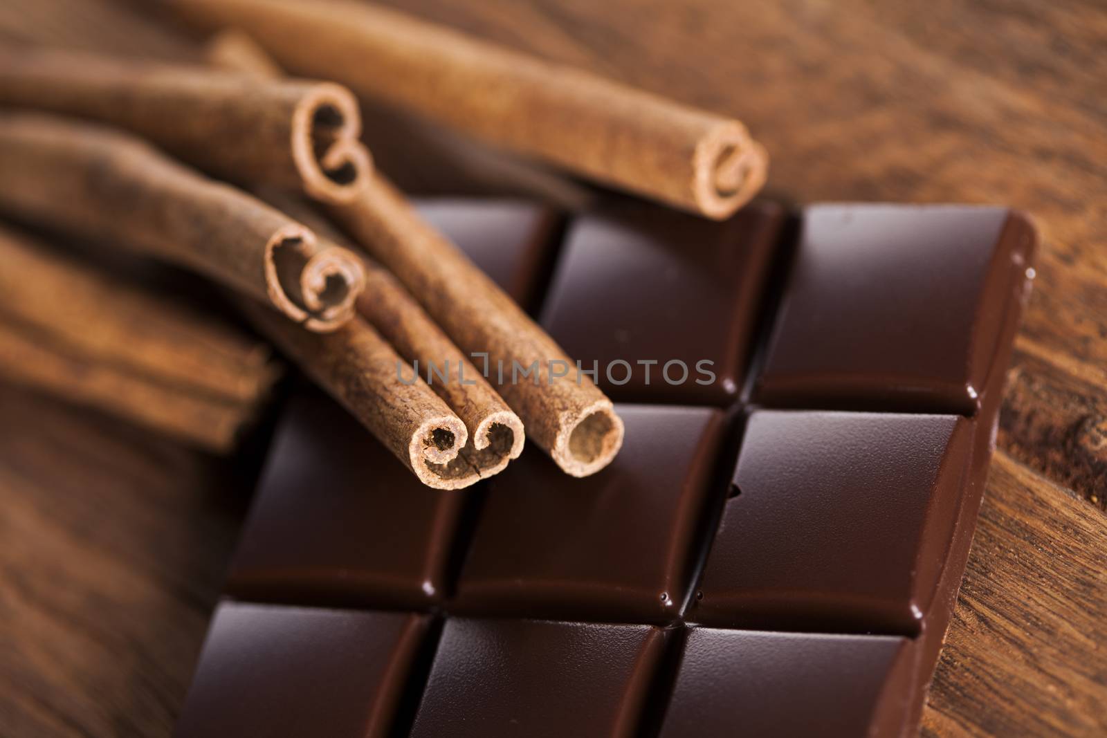 Dark chocolate with  candy sweet, dessert food, cinnamon by JanPietruszka