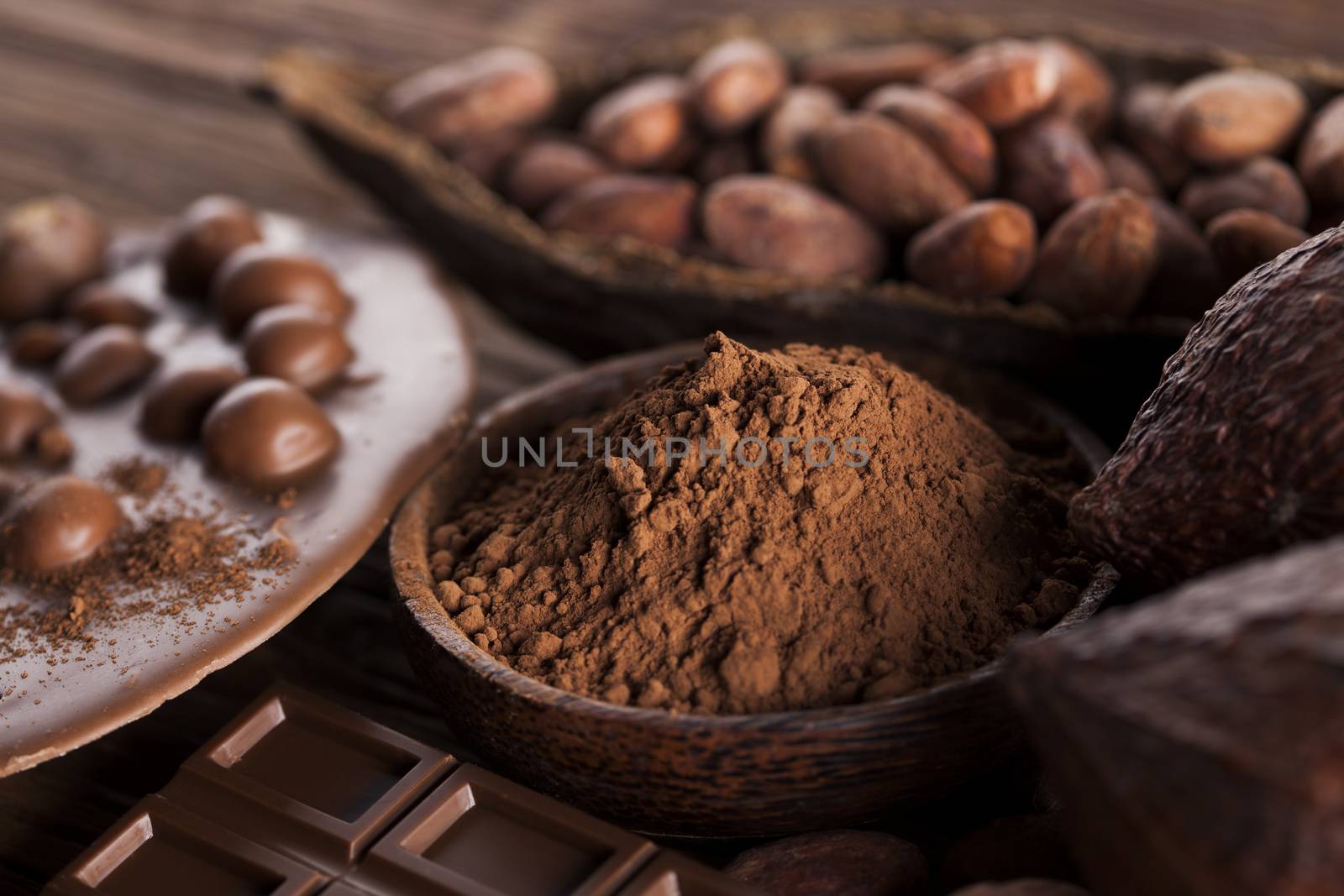 Chocolate sweet, cocoa pod and food dessert background by JanPietruszka