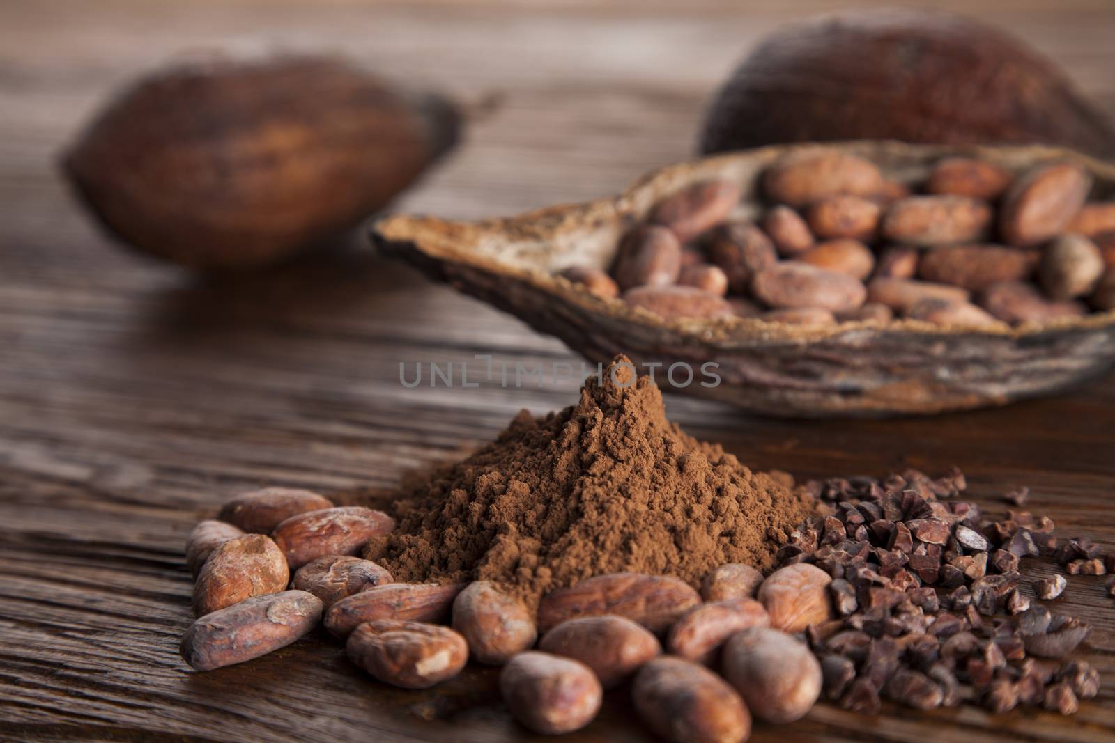 Cocoa pod on wooden background