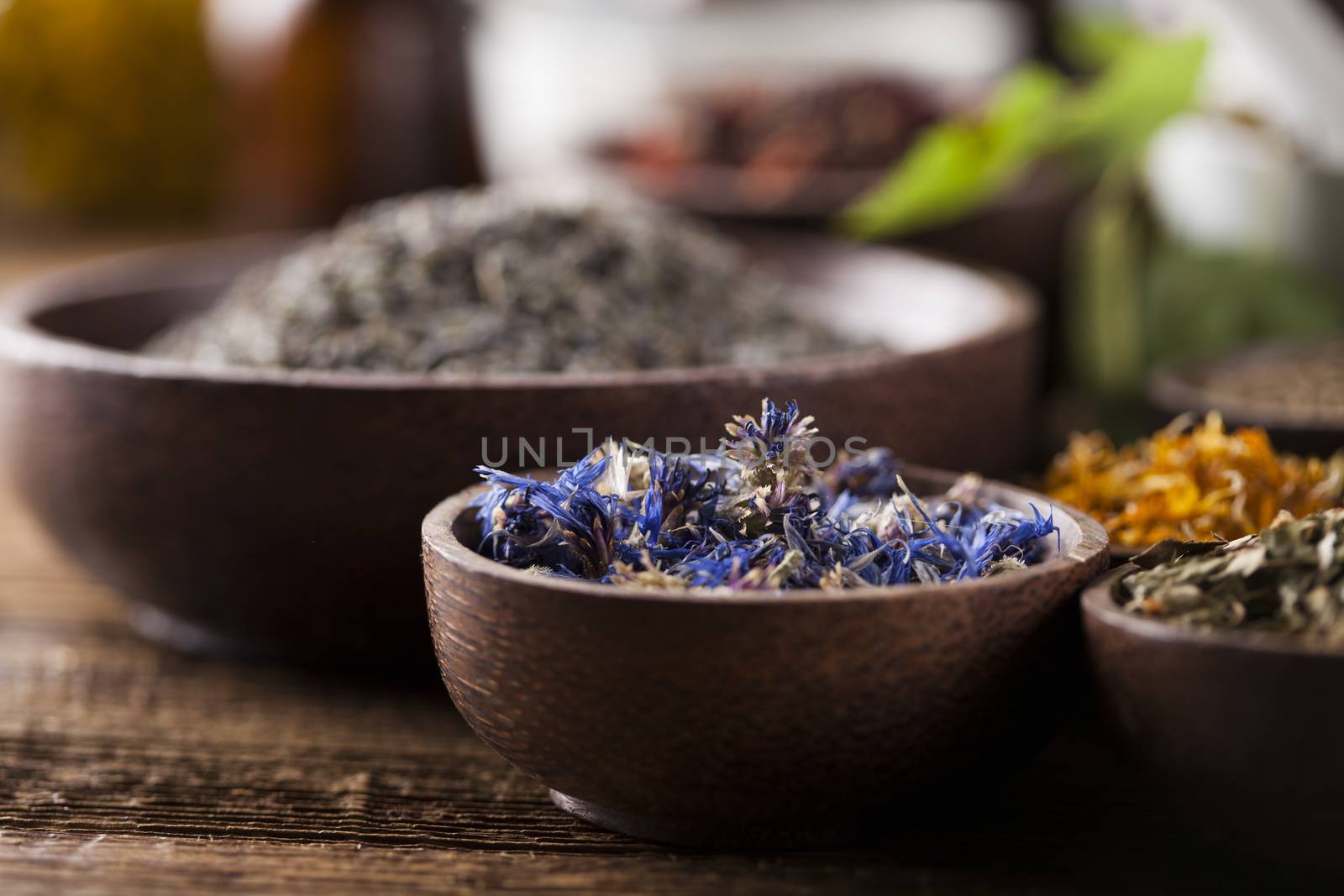 Natural medicine on wooden table background