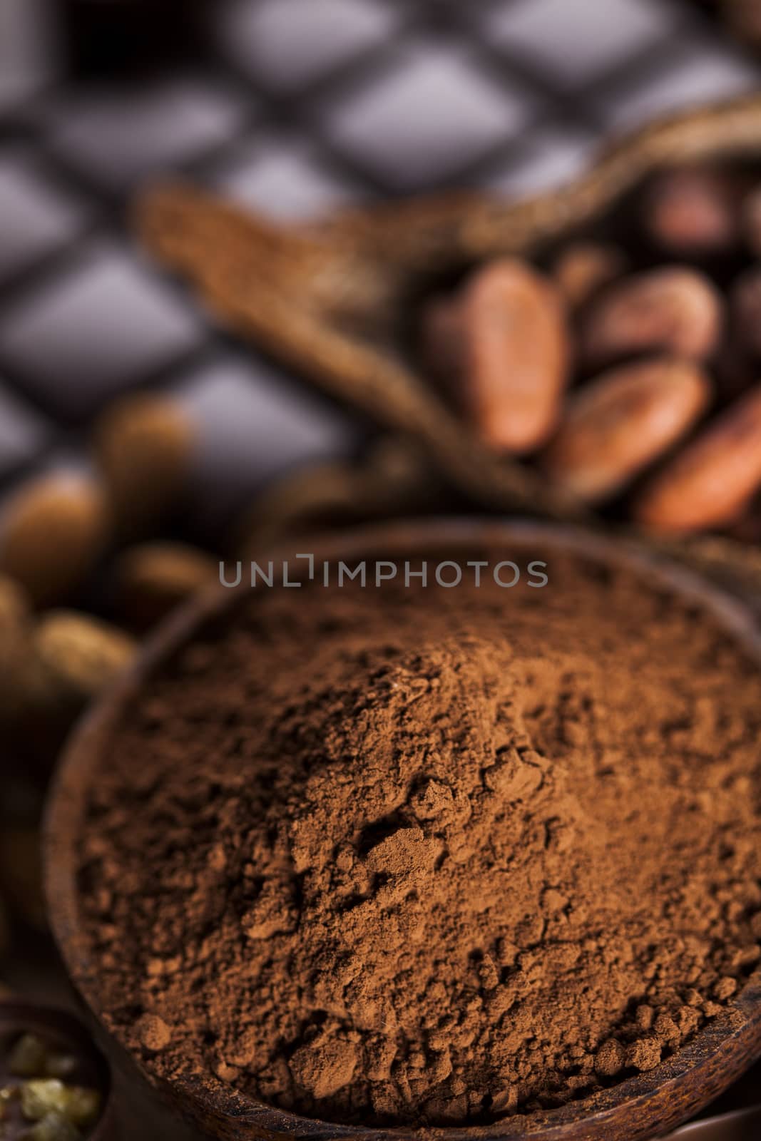 Chocolate sweet, cocoa pod and food dessert background by JanPietruszka