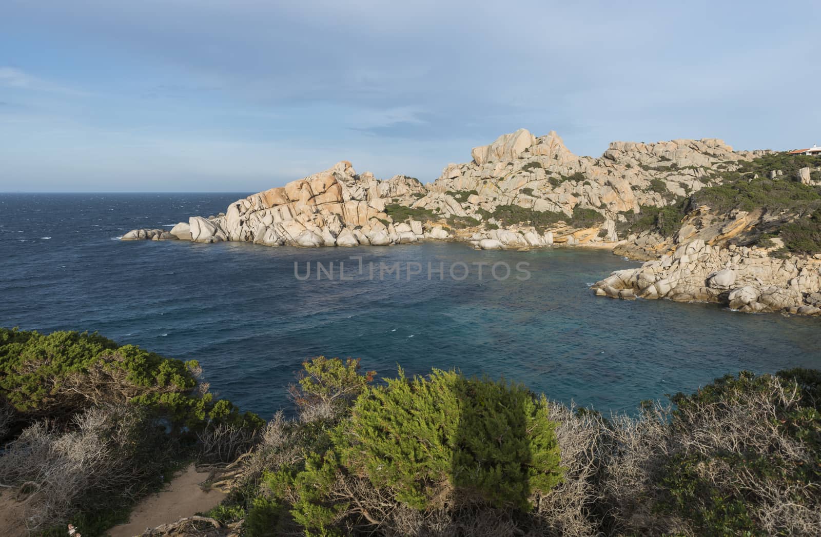 rocks and sea in palua on sardinia island by compuinfoto
