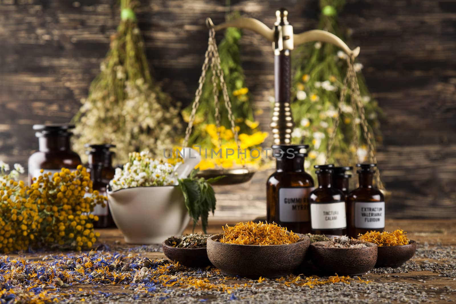 Natural medicine on wooden table background