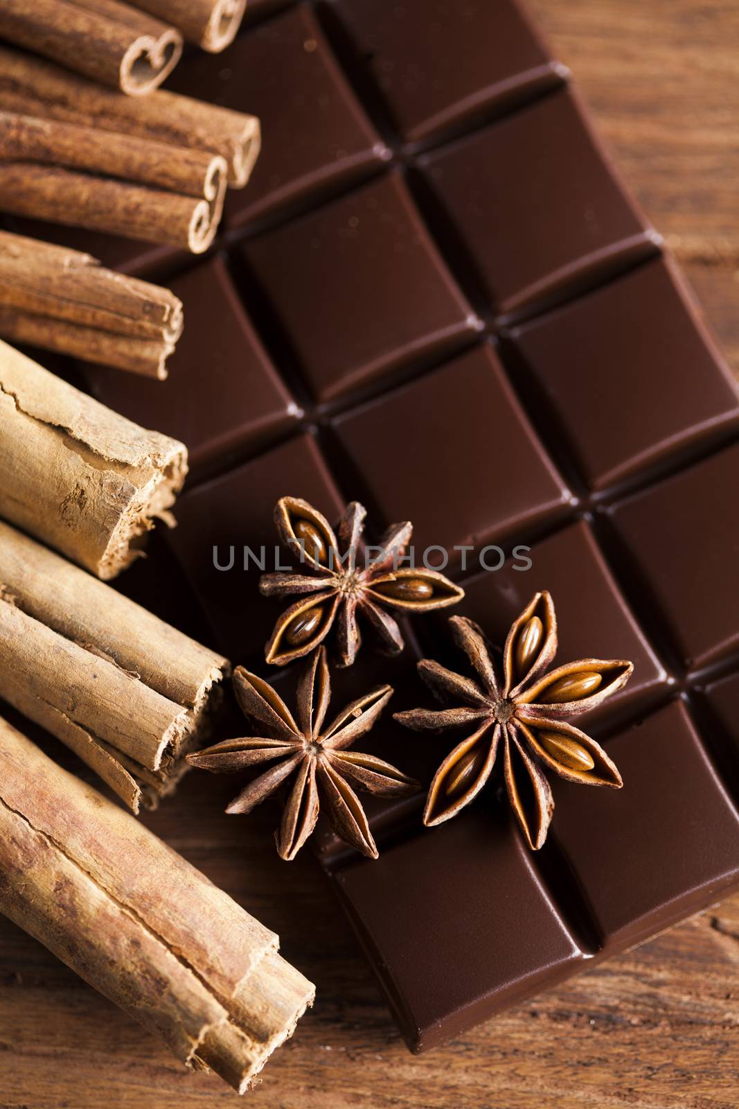 Cinnamon and anise, Dark chocolate with candy sweet by JanPietruszka