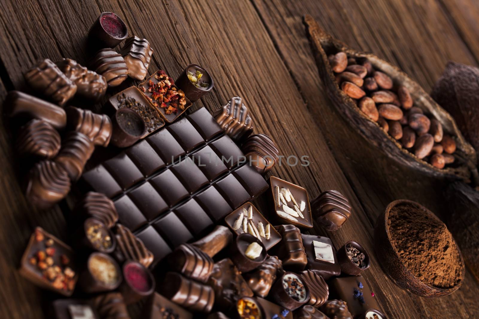 Praline Chocolate on wooden backgroud by JanPietruszka