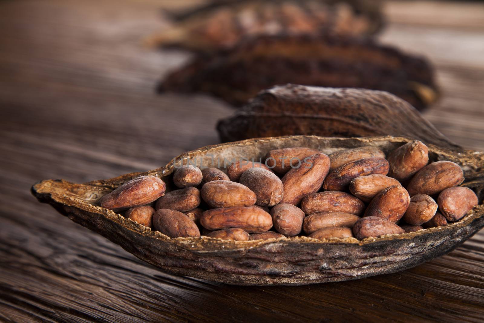 Cocoa pod on wooden background