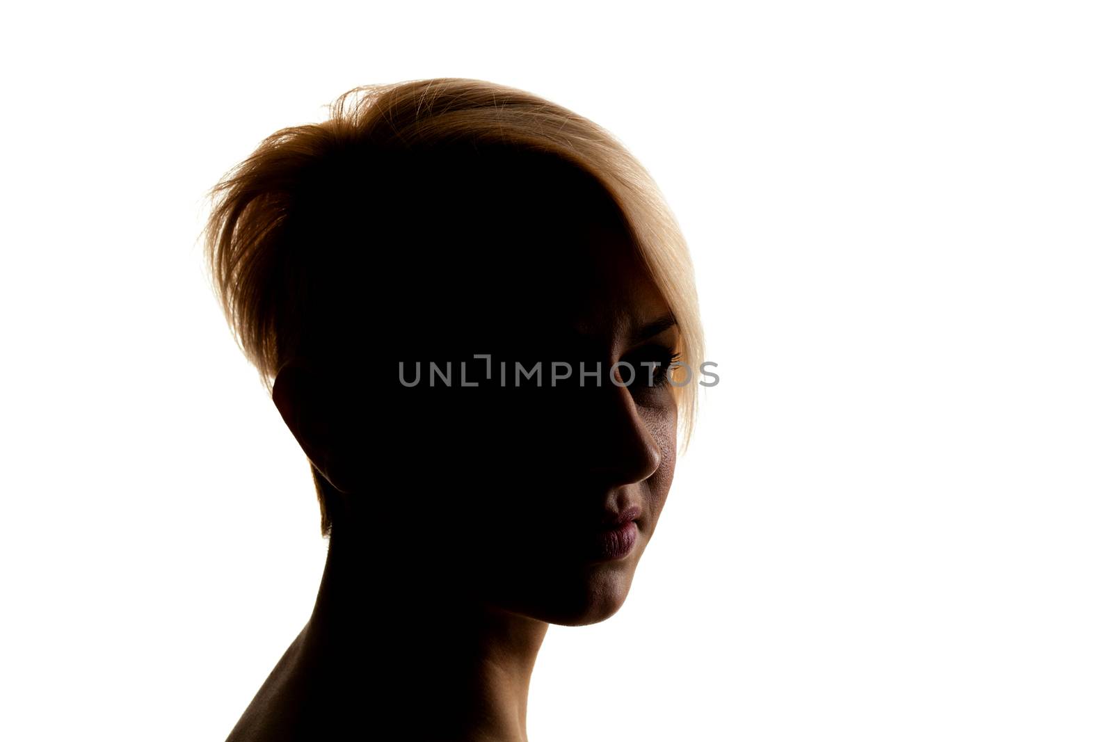 silhouette portrait of a beautiful caucasian girl with short hair