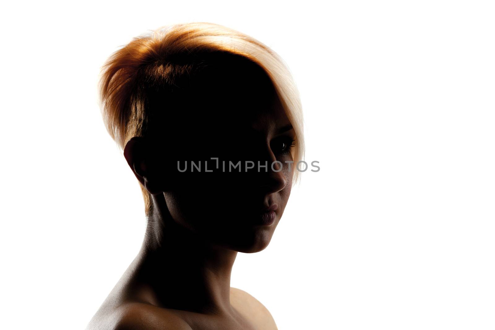 silhouette portrait of a beautiful caucasian girl with short hair
