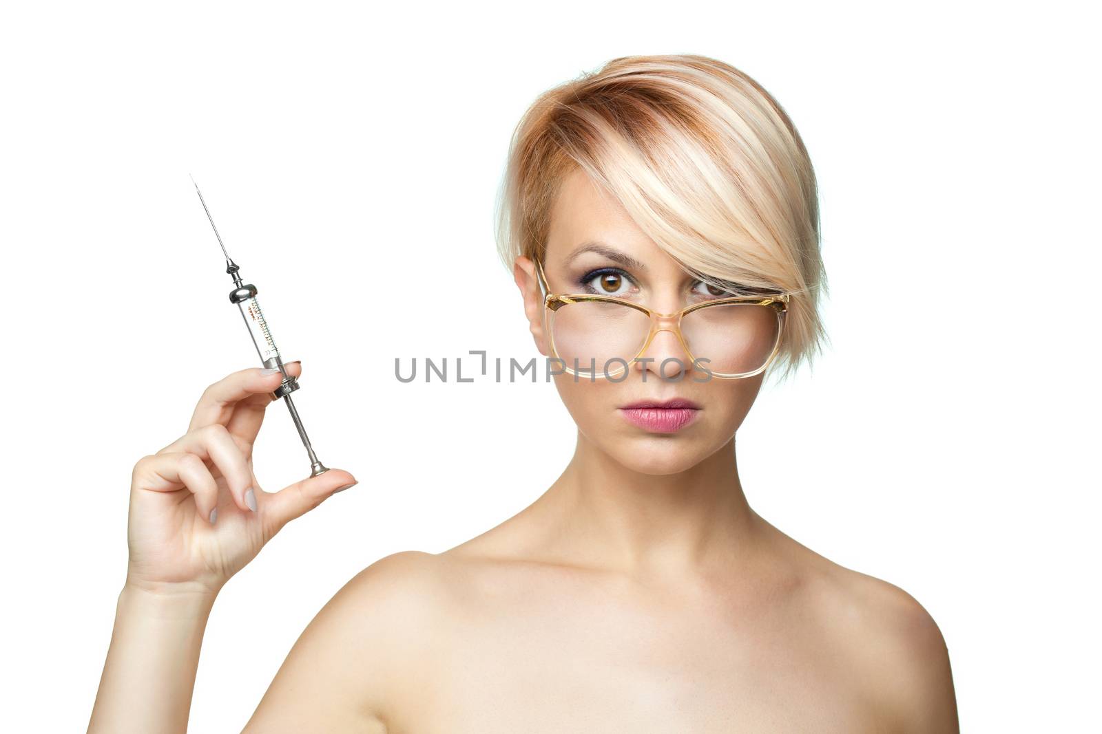 blond nurse with glasses holding a vintage metal syringe