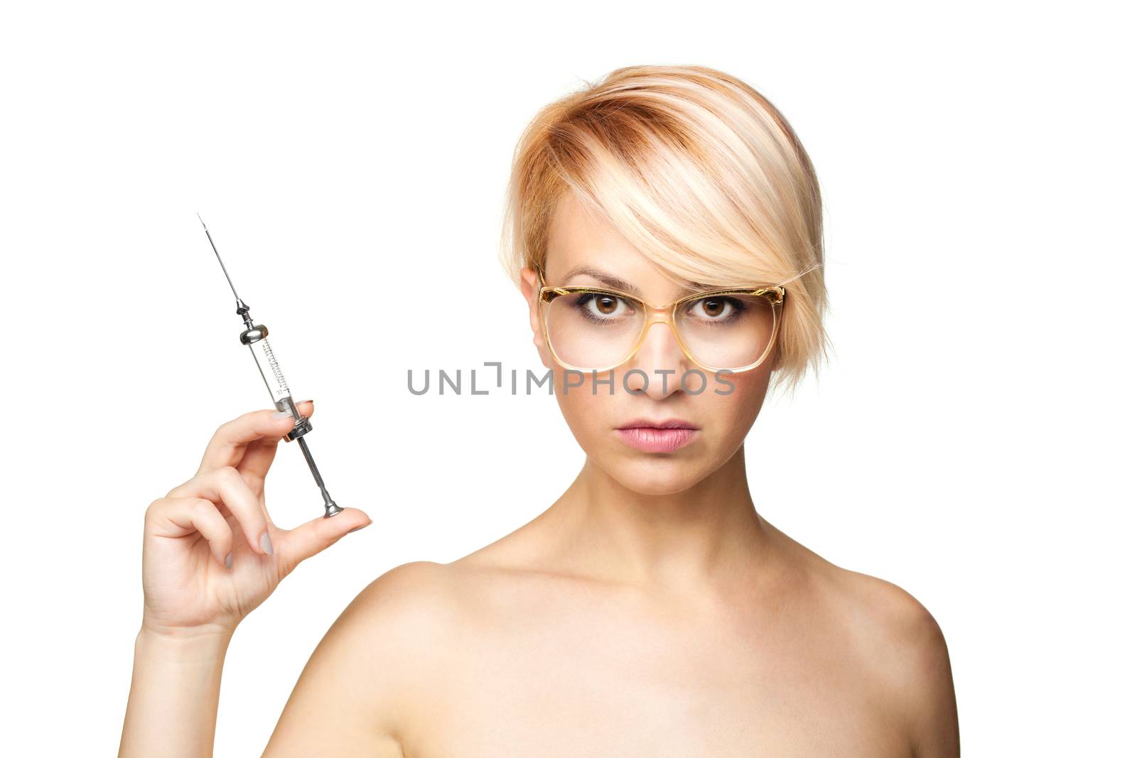 blond nurse with glasses holding a vintage metal syringe