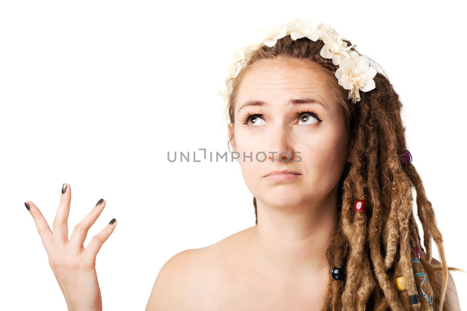 portrait of a confused caucasian girl with dreadlocks hairstyle
