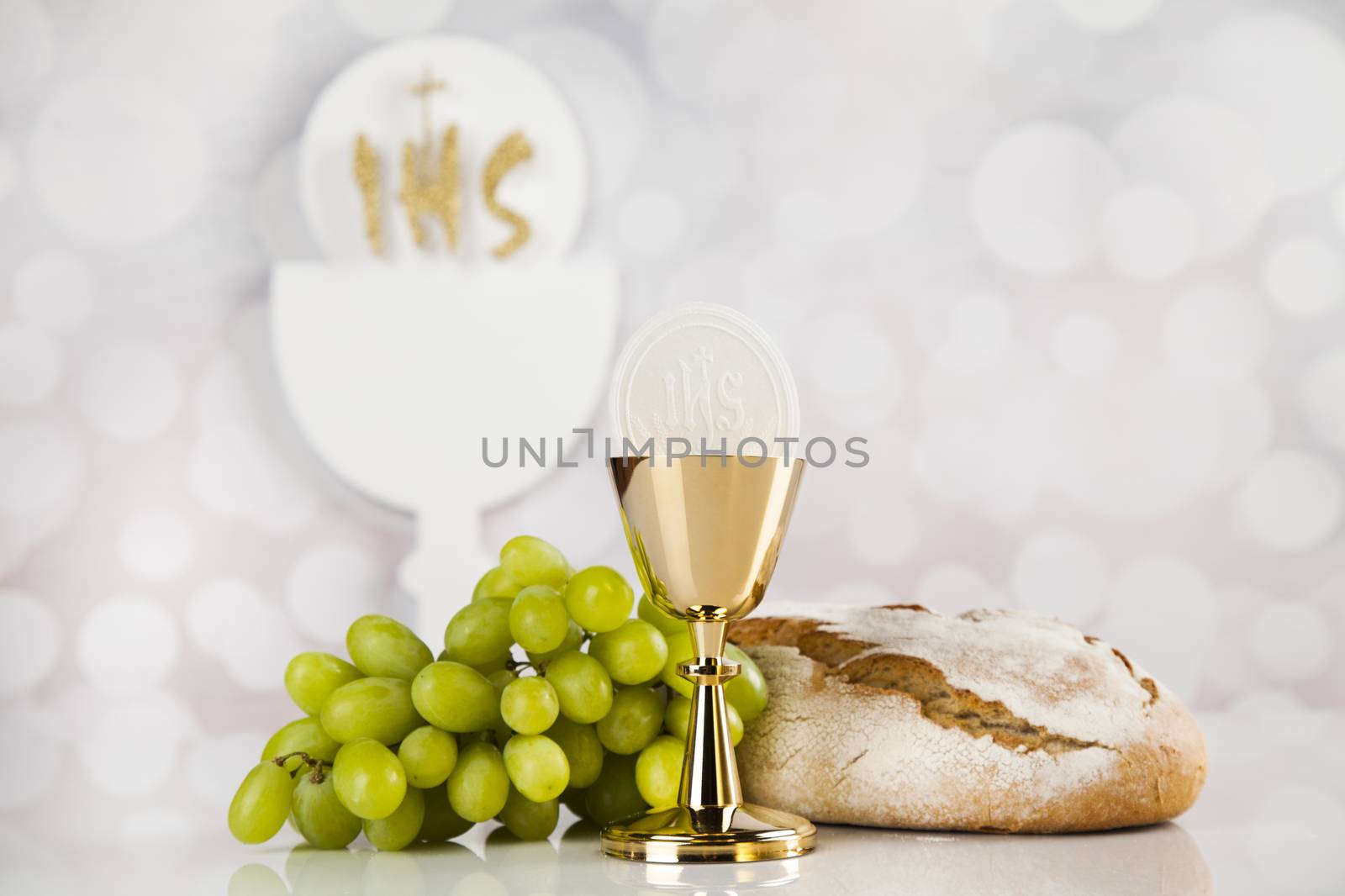 Holy communion a golden chalice, composition isolated on white by JanPietruszka