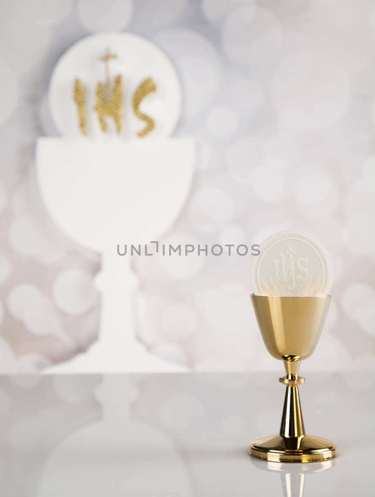 Holy communion a golden chalice, composition isolated on white by JanPietruszka