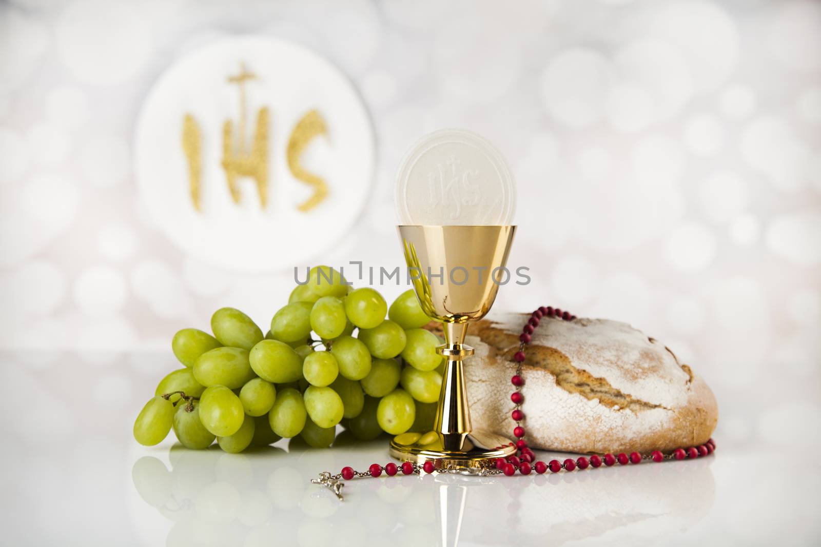 Holy communion a golden chalice, composition isolated on white by JanPietruszka