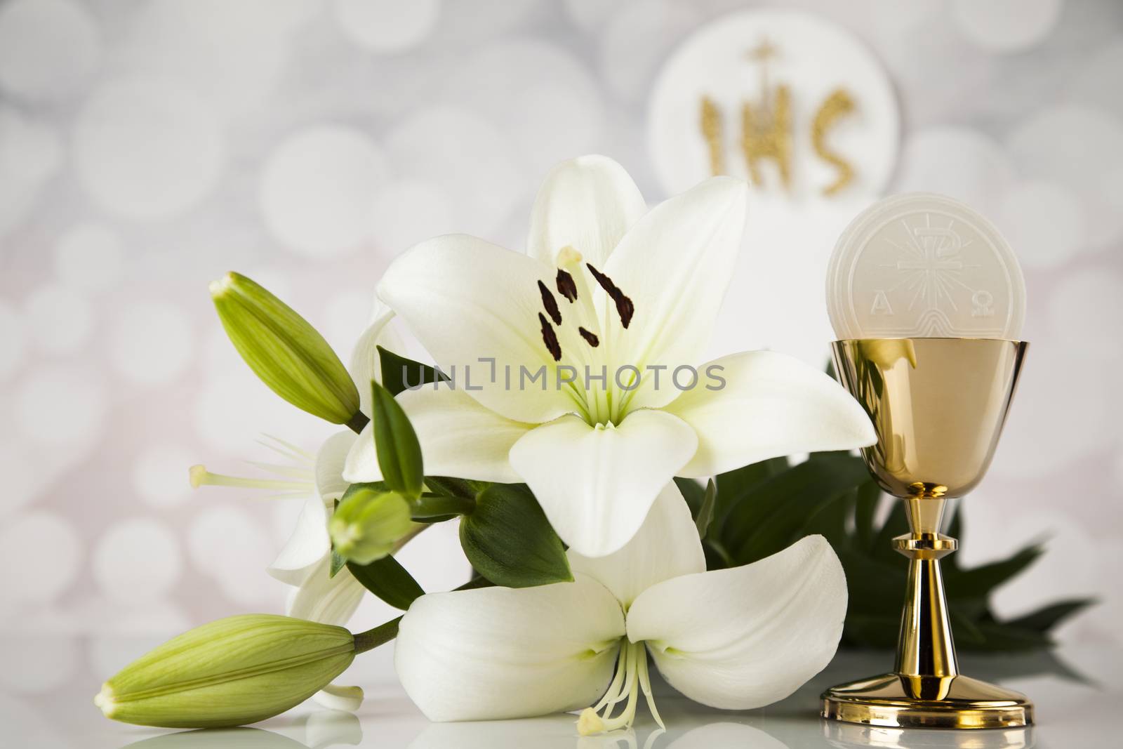 Holy communion a golden chalice with grapes and bread wafers by JanPietruszka