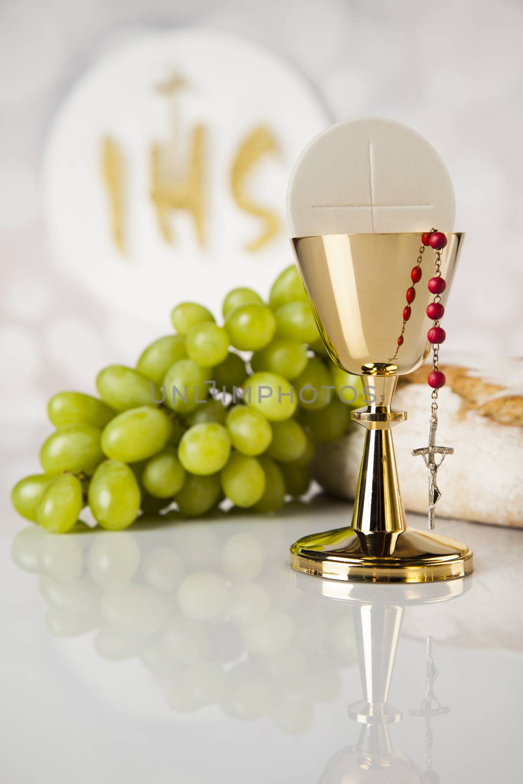 Holy communion a golden chalice, composition isolated on white by JanPietruszka