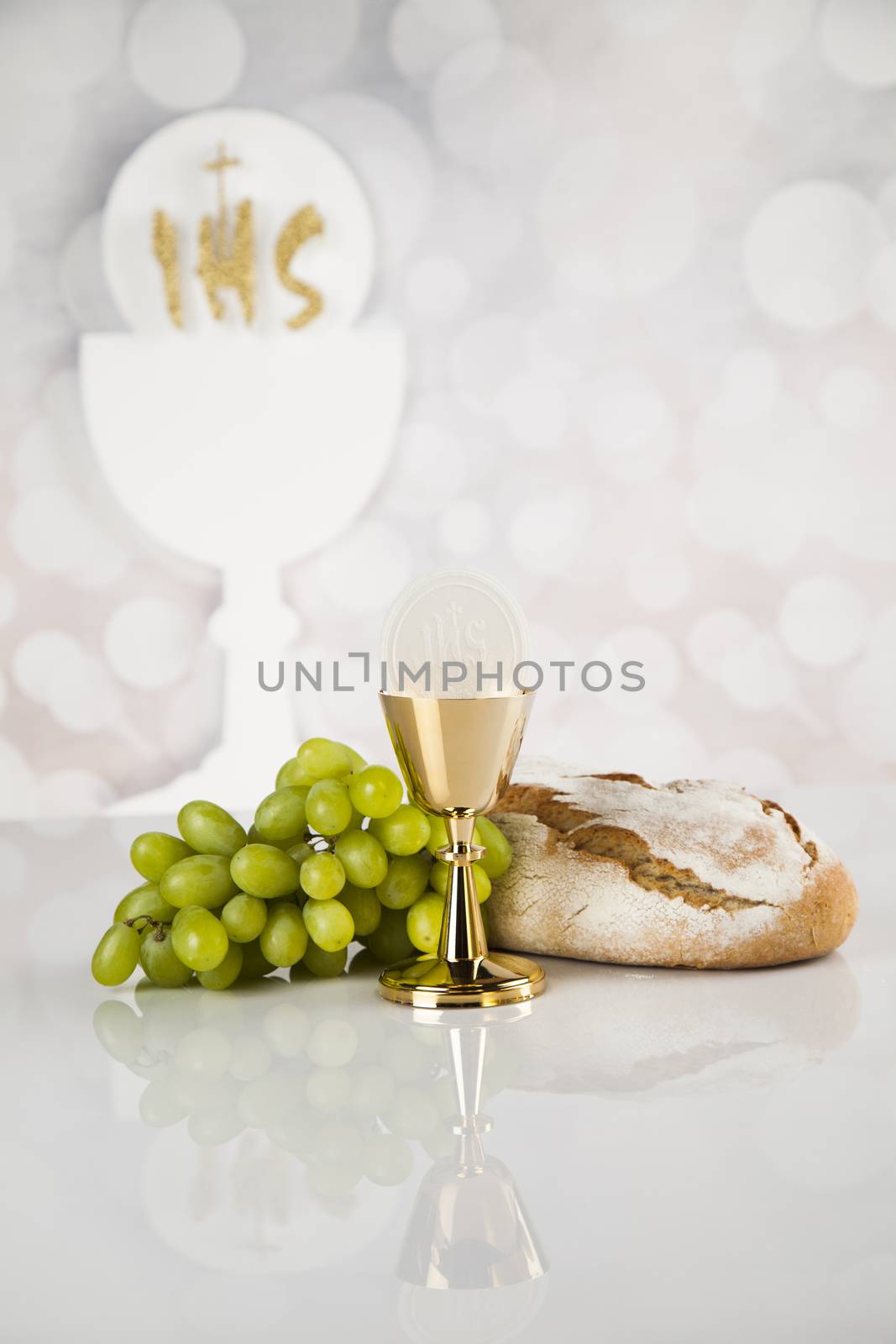 Holy communion a golden chalice, composition isolated on white by JanPietruszka