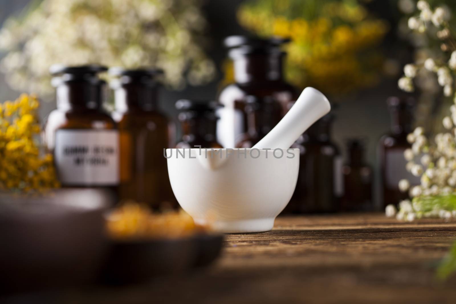 Herbal medicine on wooden desk background