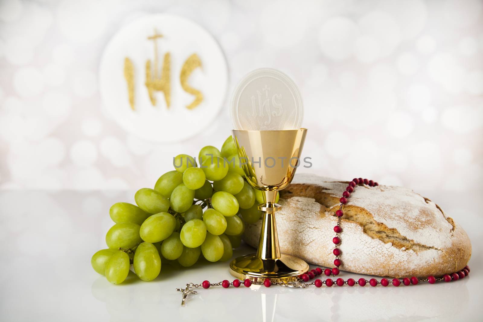 Holy communion a golden chalice, composition isolated on white by JanPietruszka