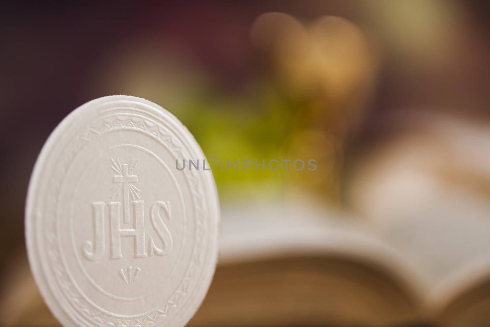 Holy communion a golden chalice with grapes and bread wafers by JanPietruszka