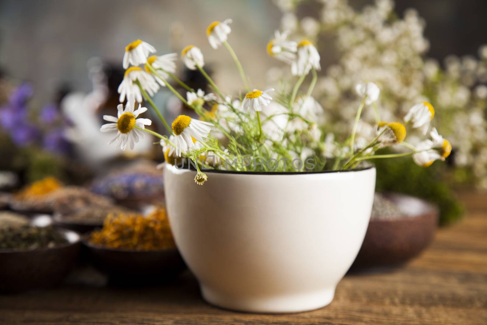 Natural medicine on wooden table background by JanPietruszka