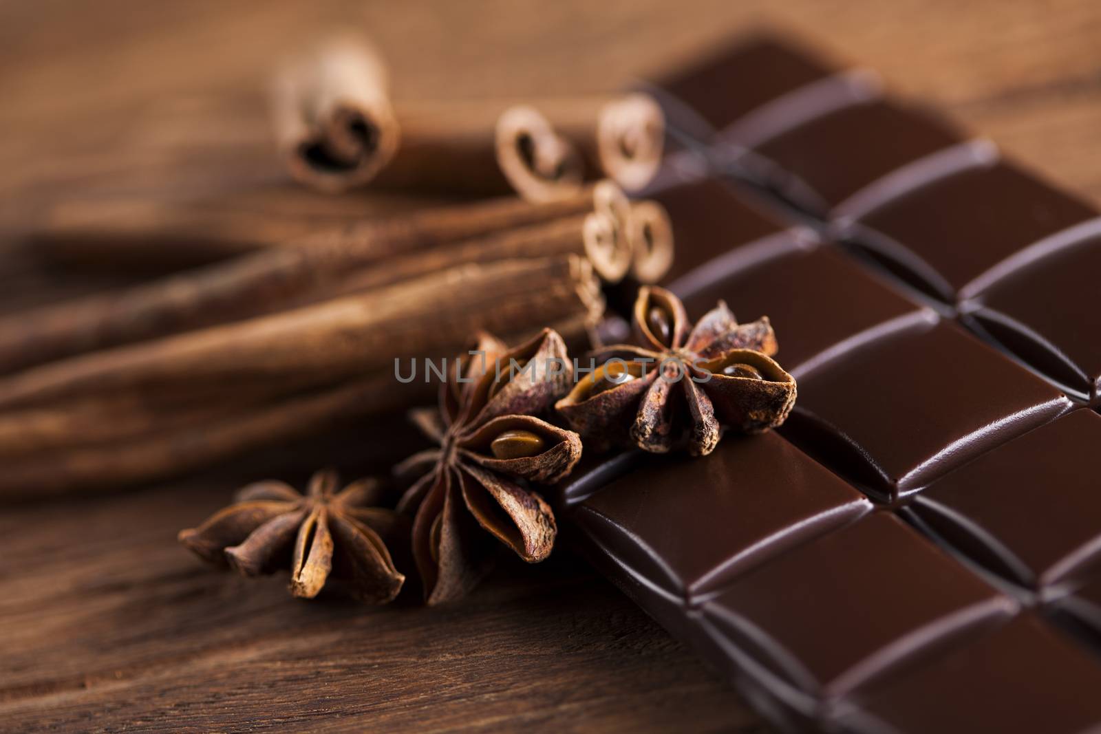Cinnamon and anise, Dark chocolate with candy sweet by JanPietruszka