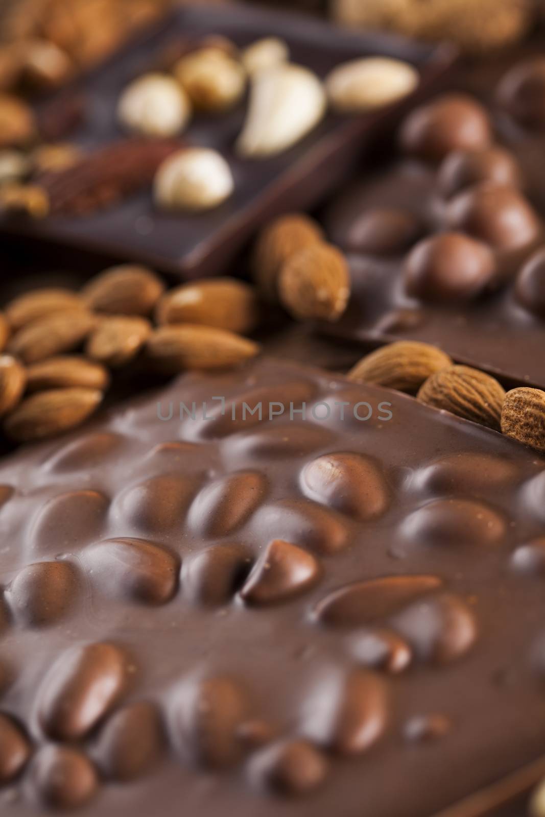 Chocolate bar, candy sweet, dessert food on wooden background by JanPietruszka