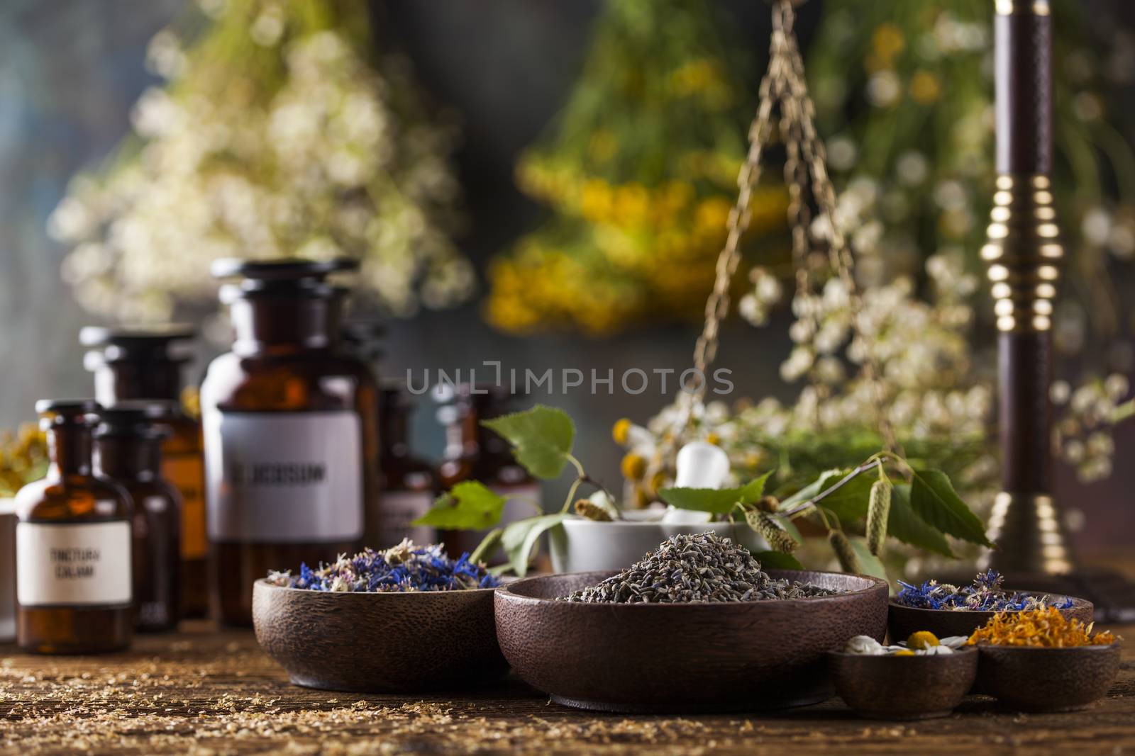 Herbal medicine on wooden desk background