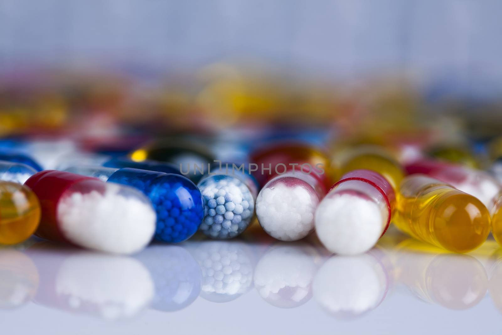 Medicine and healthy, Close up of capsules background by JanPietruszka