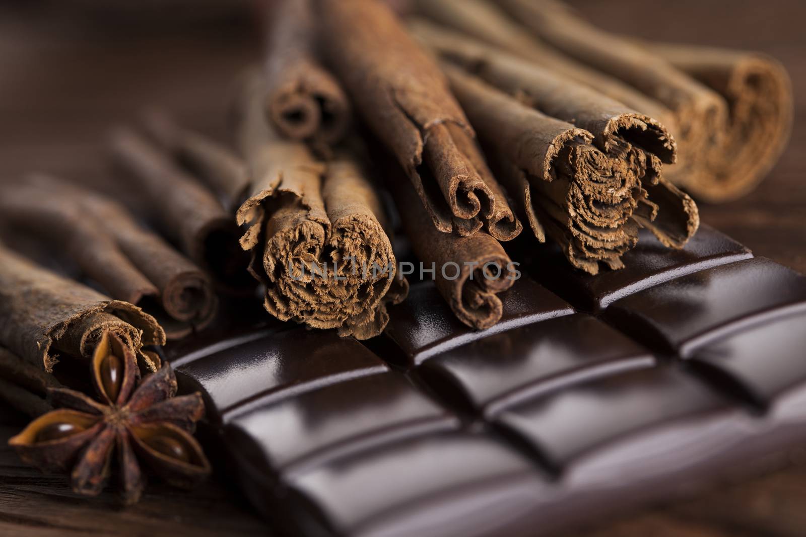 Dark chocolate with  candy sweet, dessert food, cinnamon by JanPietruszka