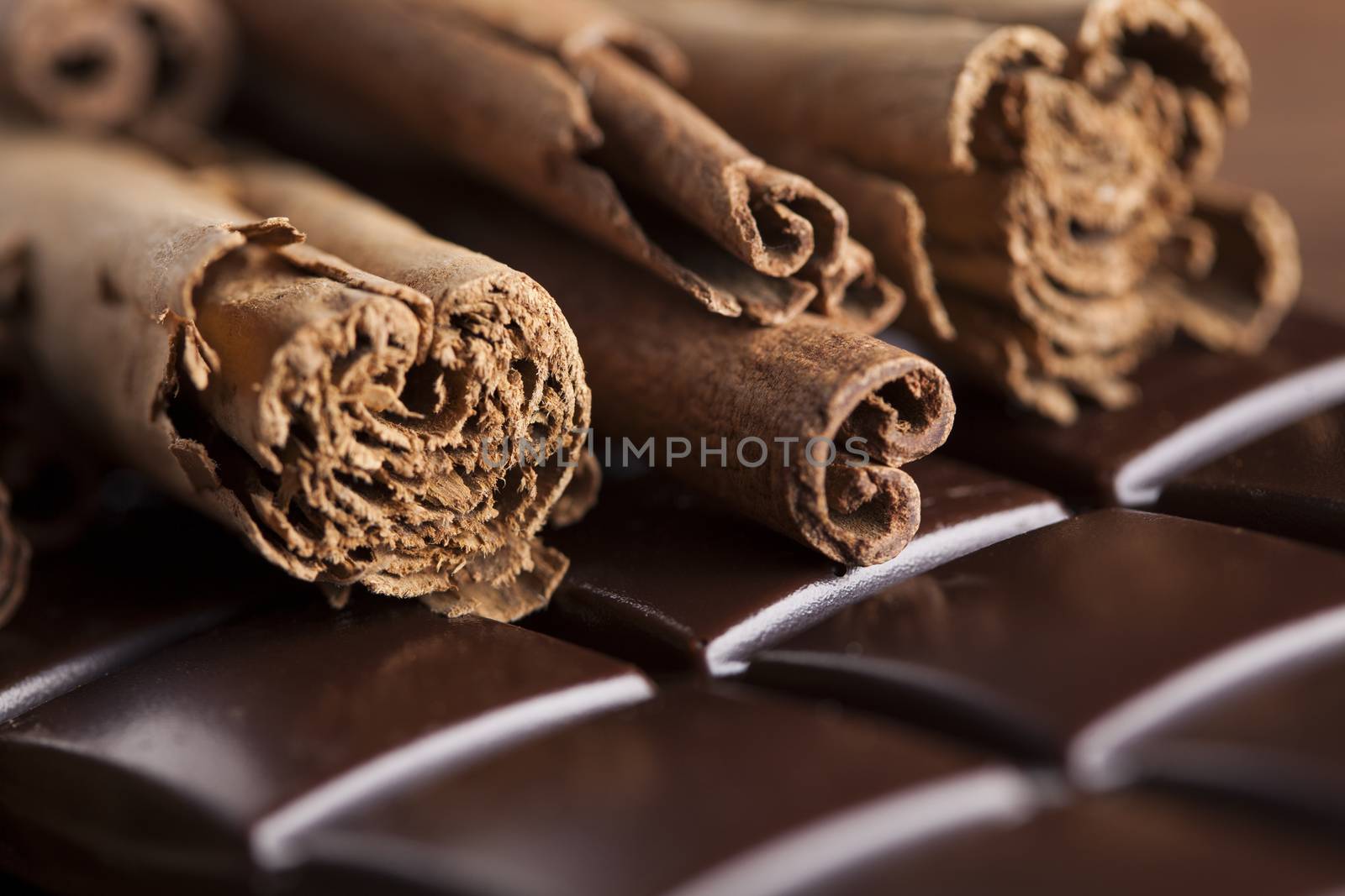 Dark chocolate with  candy sweet, dessert food, cinnamon by JanPietruszka