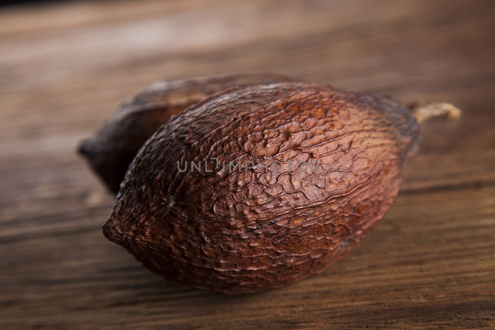 Cocoa pod on wooden table