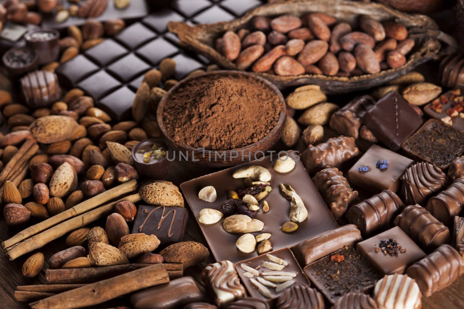 Chocolate sweet, cocoa pod and food dessert background by JanPietruszka