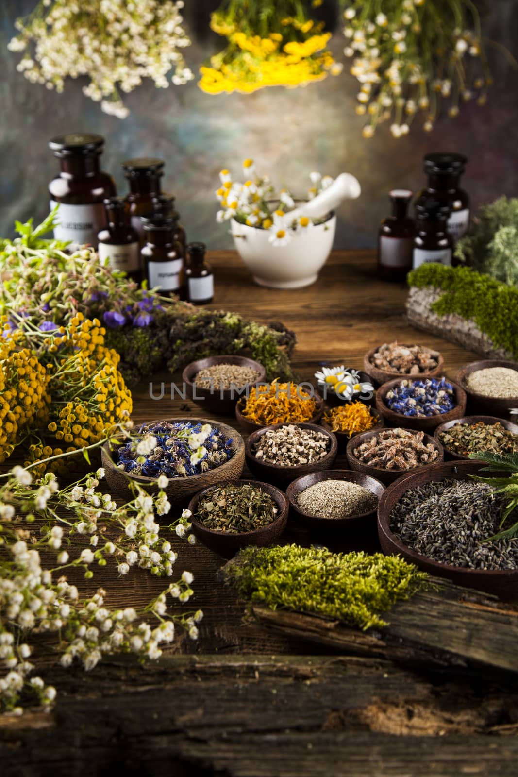 Natural remedy and mortar, healing herbs background