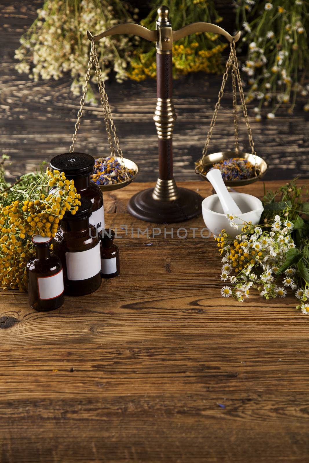 Herbal medicine on wooden desk background