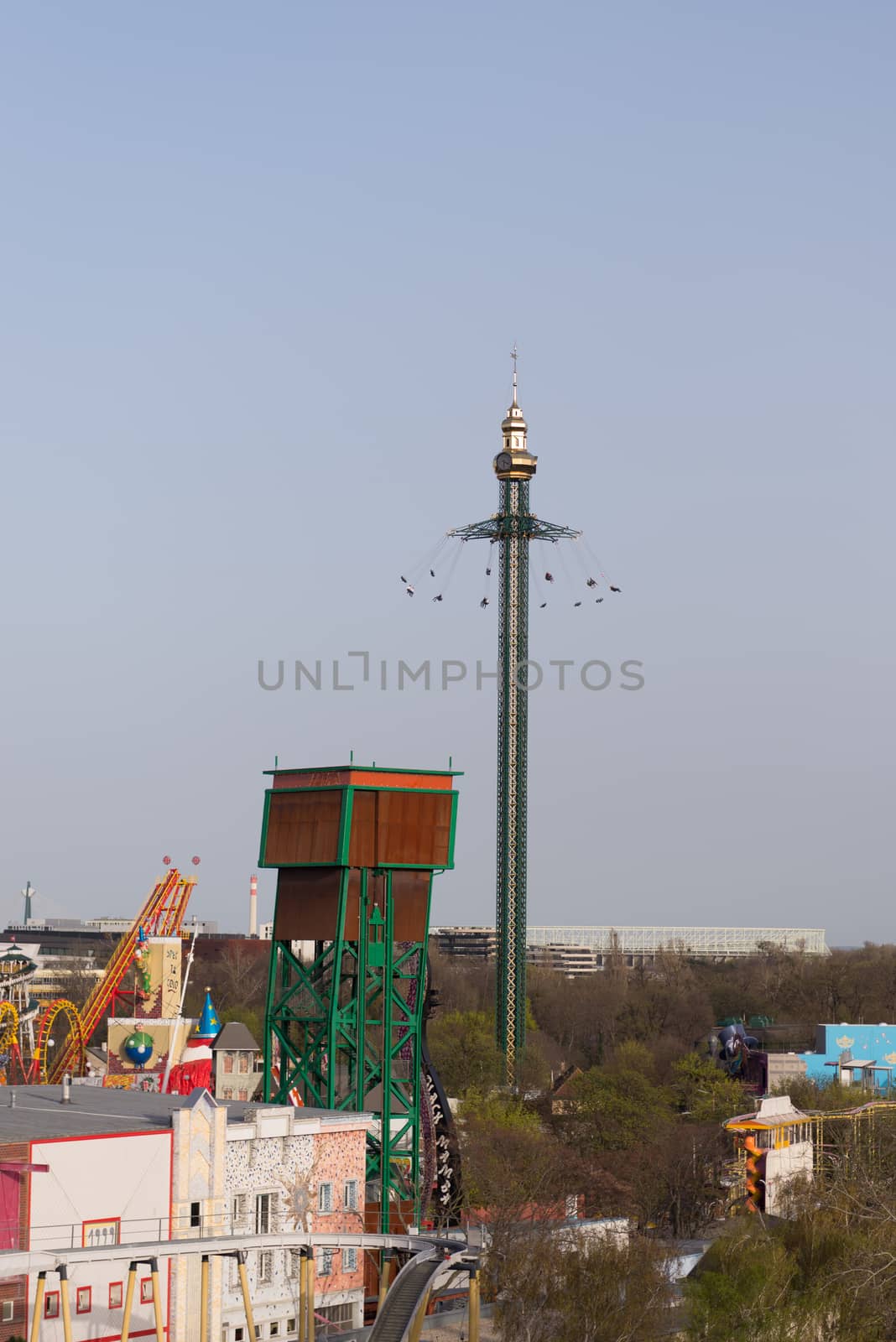 Amusement park ride, meerry go round, carousel ride on extremly high tower