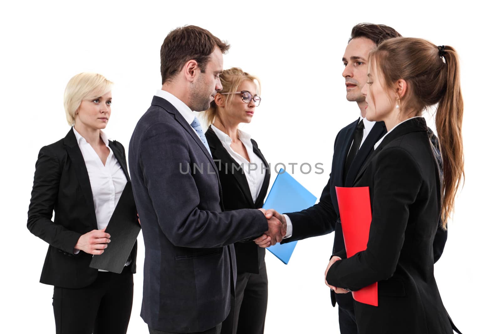 Business people shaking hands, finishing up a meeting, isolated on white background