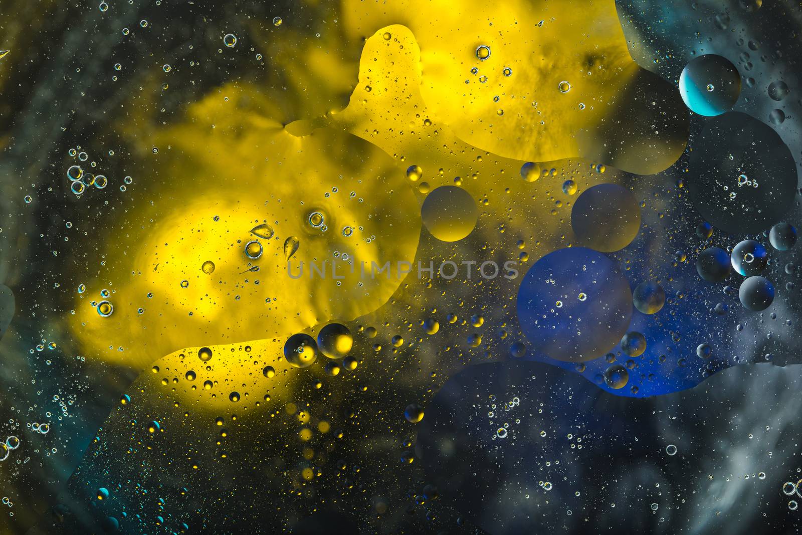 abstract background of colored spots circles on the water